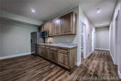 Step into the epitome of luxurious living at The Estates of on The Club At Old Kinderhook in Missouri - for sale on GolfHomes.com, golf home, golf lot