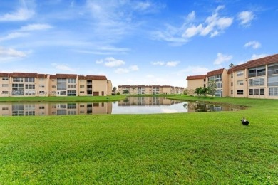 Great first floor 2/2 condo located in the 55+ community of on Sunrise Lakes Phase III in Florida - for sale on GolfHomes.com, golf home, golf lot