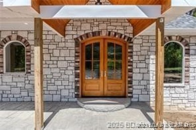 Step into the epitome of luxurious living at The Estates of on The Club At Old Kinderhook in Missouri - for sale on GolfHomes.com, golf home, golf lot