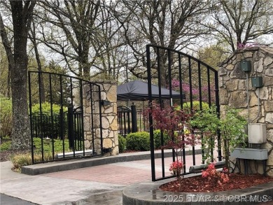 Step into the epitome of luxurious living at The Estates of on The Club At Old Kinderhook in Missouri - for sale on GolfHomes.com, golf home, golf lot