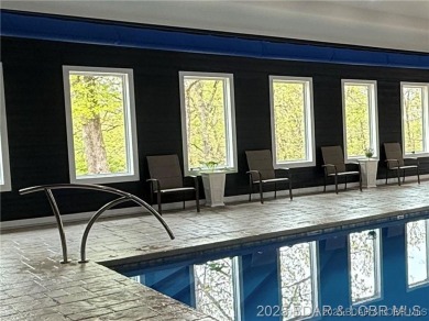 Step into the epitome of luxurious living at The Estates of on The Club At Old Kinderhook in Missouri - for sale on GolfHomes.com, golf home, golf lot