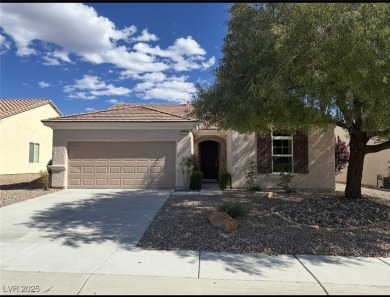 SUPER CLEAN AND LIGHTLY LIVED IN VIRGINIA MODEL.  BEAUTIFUL on Revere Golf Club in Nevada - for sale on GolfHomes.com, golf home, golf lot