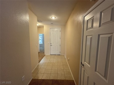 SUPER CLEAN AND LIGHTLY LIVED IN VIRGINIA MODEL.  BEAUTIFUL on Revere Golf Club in Nevada - for sale on GolfHomes.com, golf home, golf lot