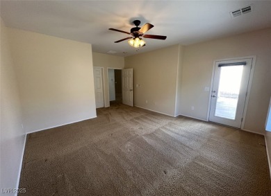 SUPER CLEAN AND LIGHTLY LIVED IN VIRGINIA MODEL.  BEAUTIFUL on Revere Golf Club in Nevada - for sale on GolfHomes.com, golf home, golf lot
