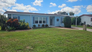 Discover this beautifully maintained home in Florida's premier on The Riverside Golf Club in Florida - for sale on GolfHomes.com, golf home, golf lot