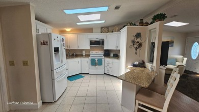 Discover this beautifully maintained home in Florida's premier on The Riverside Golf Club in Florida - for sale on GolfHomes.com, golf home, golf lot