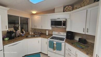Discover this beautifully maintained home in Florida's premier on The Riverside Golf Club in Florida - for sale on GolfHomes.com, golf home, golf lot