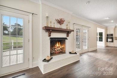 Welcome home to this stunningly remodeled 3BR/2BA residence on Rock Barn Golf and Spa in North Carolina - for sale on GolfHomes.com, golf home, golf lot