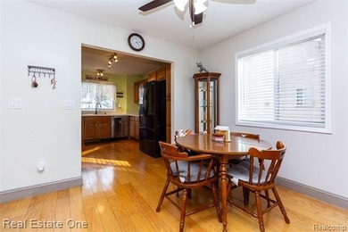 Enjoy the convenience of single level living in this beautiful on St. Clair Shores Country Club in Michigan - for sale on GolfHomes.com, golf home, golf lot