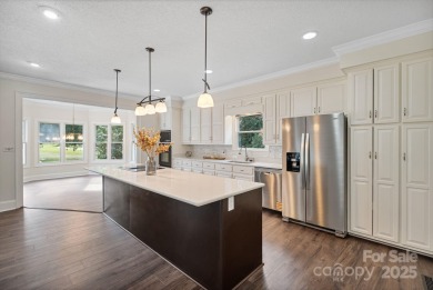 Welcome home to this stunningly remodeled 3BR/2BA residence on Rock Barn Golf and Spa in North Carolina - for sale on GolfHomes.com, golf home, golf lot
