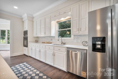 Welcome home to this stunningly remodeled 3BR/2BA residence on Rock Barn Golf and Spa in North Carolina - for sale on GolfHomes.com, golf home, golf lot