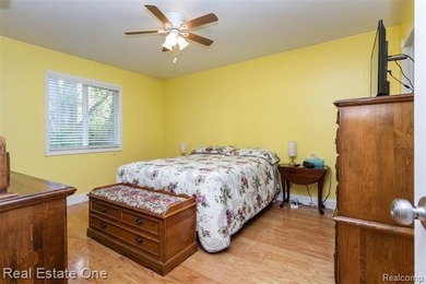 Enjoy the convenience of single level living in this beautiful on St. Clair Shores Country Club in Michigan - for sale on GolfHomes.com, golf home, golf lot