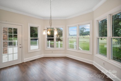 Welcome home to this stunningly remodeled 3BR/2BA residence on Rock Barn Golf and Spa in North Carolina - for sale on GolfHomes.com, golf home, golf lot