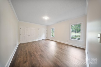 Welcome home to this stunningly remodeled 3BR/2BA residence on Rock Barn Golf and Spa in North Carolina - for sale on GolfHomes.com, golf home, golf lot