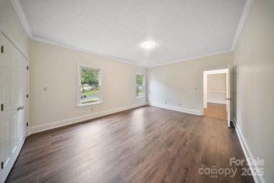 Welcome home to this stunningly remodeled 3BR/2BA residence on Rock Barn Golf and Spa in North Carolina - for sale on GolfHomes.com, golf home, golf lot