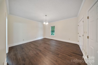 Welcome home to this stunningly remodeled 3BR/2BA residence on Rock Barn Golf and Spa in North Carolina - for sale on GolfHomes.com, golf home, golf lot
