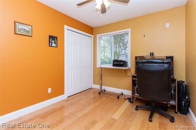 Enjoy the convenience of single level living in this beautiful on St. Clair Shores Country Club in Michigan - for sale on GolfHomes.com, golf home, golf lot