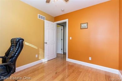 Enjoy the convenience of single level living in this beautiful on St. Clair Shores Country Club in Michigan - for sale on GolfHomes.com, golf home, golf lot