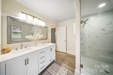 Welcome home to this stunningly remodeled 3BR/2BA residence on Rock Barn Golf and Spa in North Carolina - for sale on GolfHomes.com, golf home, golf lot