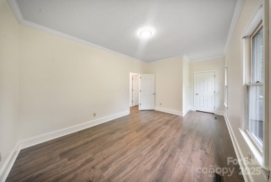 Welcome home to this stunningly remodeled 3BR/2BA residence on Rock Barn Golf and Spa in North Carolina - for sale on GolfHomes.com, golf home, golf lot