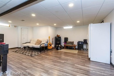 Enjoy the convenience of single level living in this beautiful on St. Clair Shores Country Club in Michigan - for sale on GolfHomes.com, golf home, golf lot