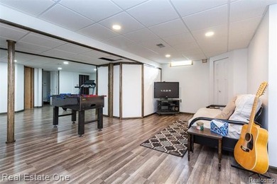 Enjoy the convenience of single level living in this beautiful on St. Clair Shores Country Club in Michigan - for sale on GolfHomes.com, golf home, golf lot