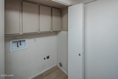 Location, Location, Location! This updated golf course condo on London Bridge Golf Course in Arizona - for sale on GolfHomes.com, golf home, golf lot