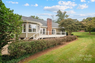 Welcome home to this stunningly remodeled 3BR/2BA residence on Rock Barn Golf and Spa in North Carolina - for sale on GolfHomes.com, golf home, golf lot