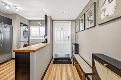 Stylish Top Floor Condo in Clearwater's Cove Cay Community on Cove Cay Country Club in Florida - for sale on GolfHomes.com, golf home, golf lot