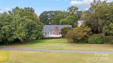 Welcome home to this stunningly remodeled 3BR/2BA residence on Rock Barn Golf and Spa in North Carolina - for sale on GolfHomes.com, golf home, golf lot