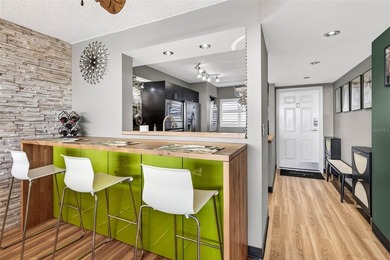 Stylish Top Floor Condo in Clearwater's Cove Cay Community on Cove Cay Country Club in Florida - for sale on GolfHomes.com, golf home, golf lot