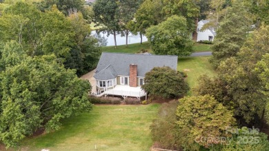 Welcome home to this stunningly remodeled 3BR/2BA residence on Rock Barn Golf and Spa in North Carolina - for sale on GolfHomes.com, golf home, golf lot