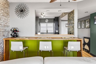 Stylish Top Floor Condo in Clearwater's Cove Cay Community on Cove Cay Country Club in Florida - for sale on GolfHomes.com, golf home, golf lot