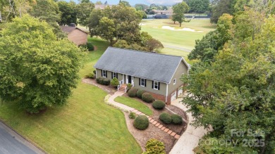 Welcome home to this stunningly remodeled 3BR/2BA residence on Rock Barn Golf and Spa in North Carolina - for sale on GolfHomes.com, golf home, golf lot