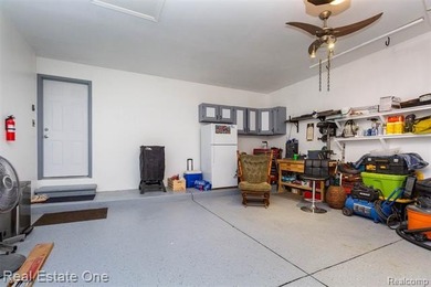 Enjoy the convenience of single level living in this beautiful on St. Clair Shores Country Club in Michigan - for sale on GolfHomes.com, golf home, golf lot