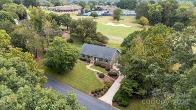 Welcome home to this stunningly remodeled 3BR/2BA residence on Rock Barn Golf and Spa in North Carolina - for sale on GolfHomes.com, golf home, golf lot