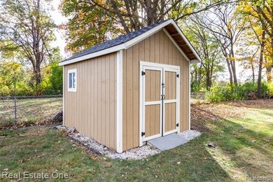 Enjoy the convenience of single level living in this beautiful on St. Clair Shores Country Club in Michigan - for sale on GolfHomes.com, golf home, golf lot