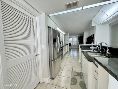 Discover coastal elegance in this 3-bedroom, 3-bathroom on Harbour Village Golf and Yacht Club in Florida - for sale on GolfHomes.com, golf home, golf lot