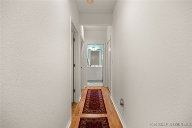 Enjoy peaceful lake living in this beautifully situated on The Club At Old Kinderhook in Missouri - for sale on GolfHomes.com, golf home, golf lot