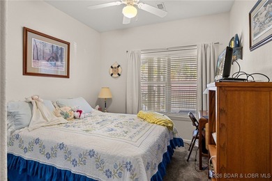 Enjoy peaceful lake living in this beautifully situated on The Club At Old Kinderhook in Missouri - for sale on GolfHomes.com, golf home, golf lot