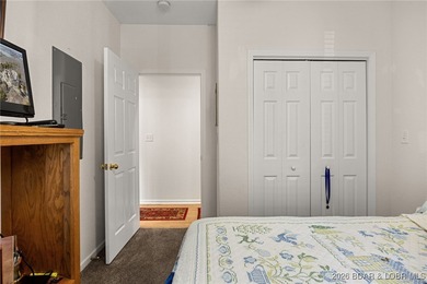 Enjoy peaceful lake living in this beautifully situated on The Club At Old Kinderhook in Missouri - for sale on GolfHomes.com, golf home, golf lot