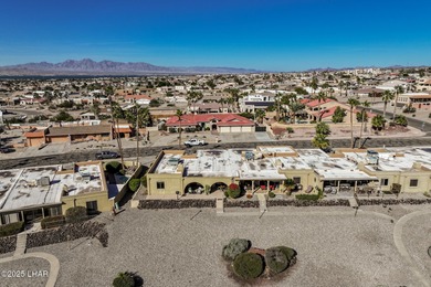 Location, Location, Location! This updated golf course condo on London Bridge Golf Course in Arizona - for sale on GolfHomes.com, golf home, golf lot