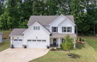 Step into modern luxury with this beautifully designed home on The Frog Golf Club in Georgia - for sale on GolfHomes.com, golf home, golf lot