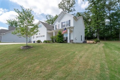 Step into modern luxury with this beautifully designed home on The Frog Golf Club in Georgia - for sale on GolfHomes.com, golf home, golf lot