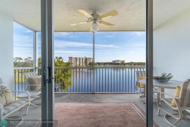 EXPERIENCE DRAMATIC WATER VIEWS FROM THIS CORNER TURNKEY UNIT! on Palm-Aire Country Club and Resort - Palms in Florida - for sale on GolfHomes.com, golf home, golf lot