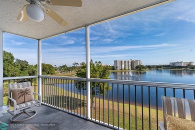 EXPERIENCE DRAMATIC WATER VIEWS FROM THIS CORNER TURNKEY UNIT! on Palm-Aire Country Club and Resort - Palms in Florida - for sale on GolfHomes.com, golf home, golf lot
