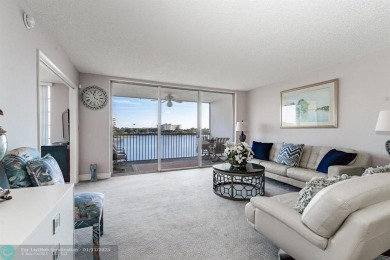 EXPERIENCE DRAMATIC WATER VIEWS FROM THIS CORNER TURNKEY UNIT! on Palm-Aire Country Club and Resort - Palms in Florida - for sale on GolfHomes.com, golf home, golf lot