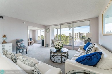 EXPERIENCE DRAMATIC WATER VIEWS FROM THIS CORNER TURNKEY UNIT! on Palm-Aire Country Club and Resort - Palms in Florida - for sale on GolfHomes.com, golf home, golf lot