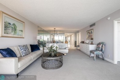 EXPERIENCE DRAMATIC WATER VIEWS FROM THIS CORNER TURNKEY UNIT! on Palm-Aire Country Club and Resort - Palms in Florida - for sale on GolfHomes.com, golf home, golf lot