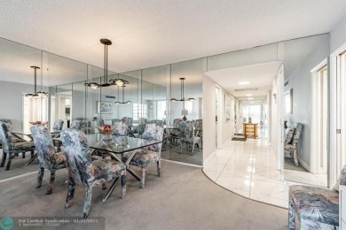 EXPERIENCE DRAMATIC WATER VIEWS FROM THIS CORNER TURNKEY UNIT! on Palm-Aire Country Club and Resort - Palms in Florida - for sale on GolfHomes.com, golf home, golf lot